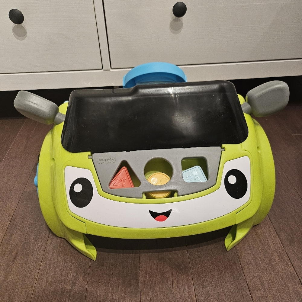 Fisher-Price Laugh & Learn Sit & Steer Driver